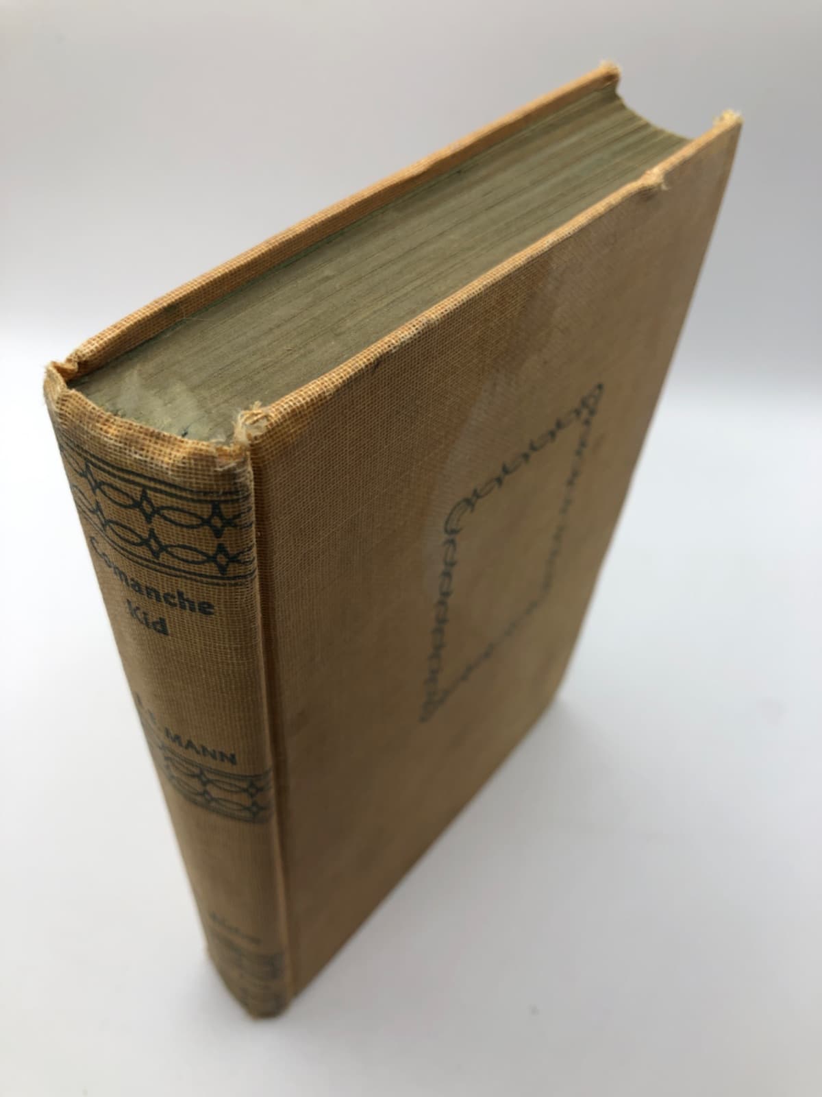 COMANCHE KID by E. B. MANN - quarter view showing binding condition