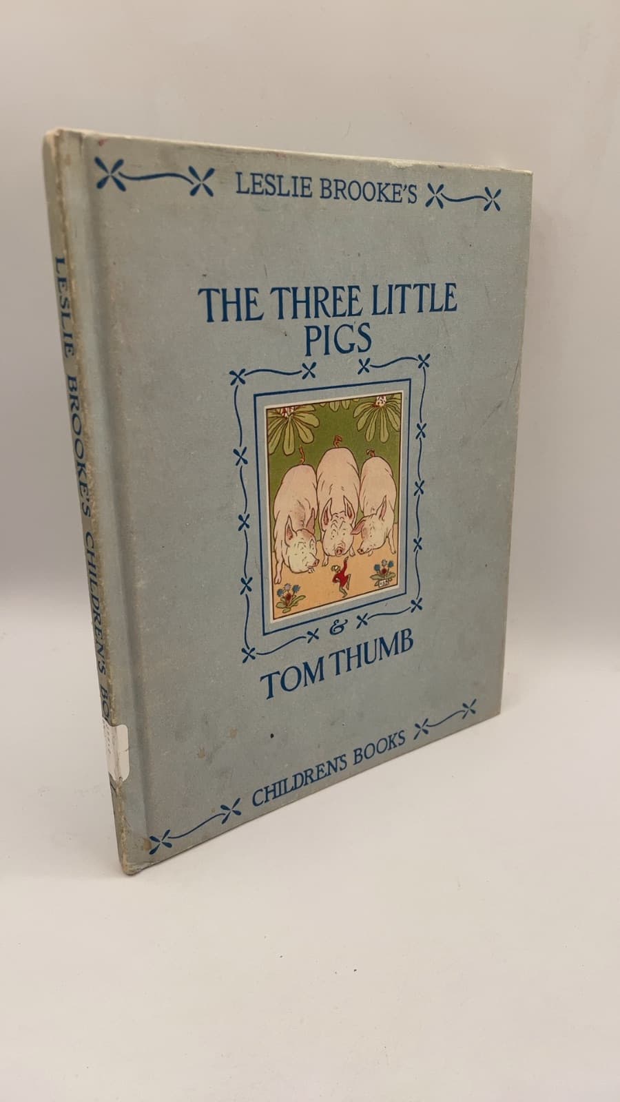 The Three Little Pigs and Tom Thumb by L. Leslie Brooke - front cover