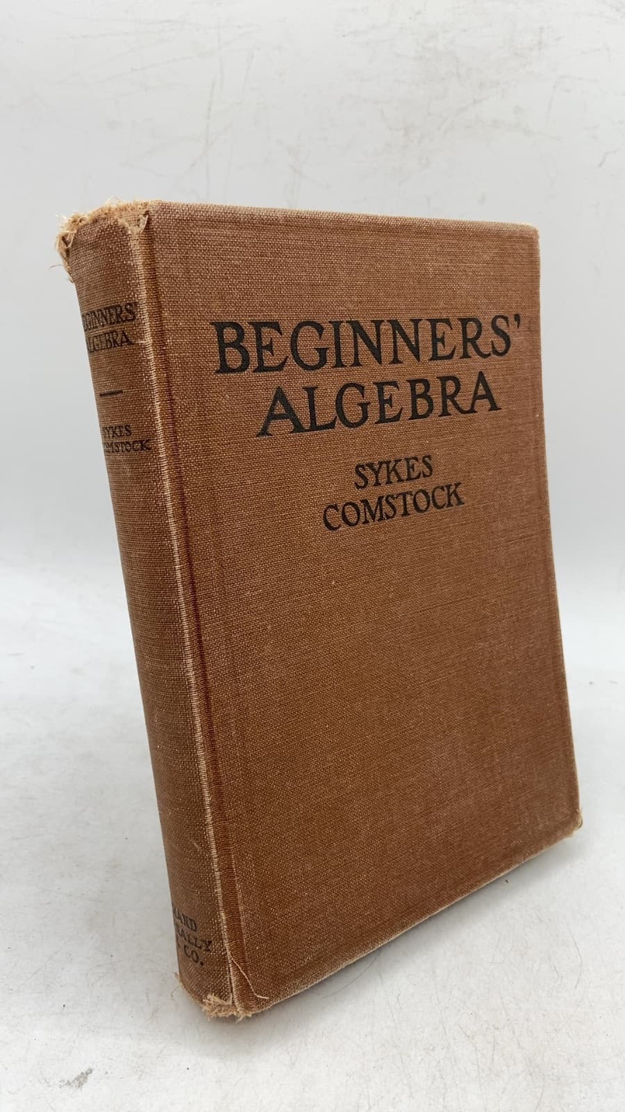 Beginners' Algebra by Mabel Sykes and Clarence E. Comstock - front cover