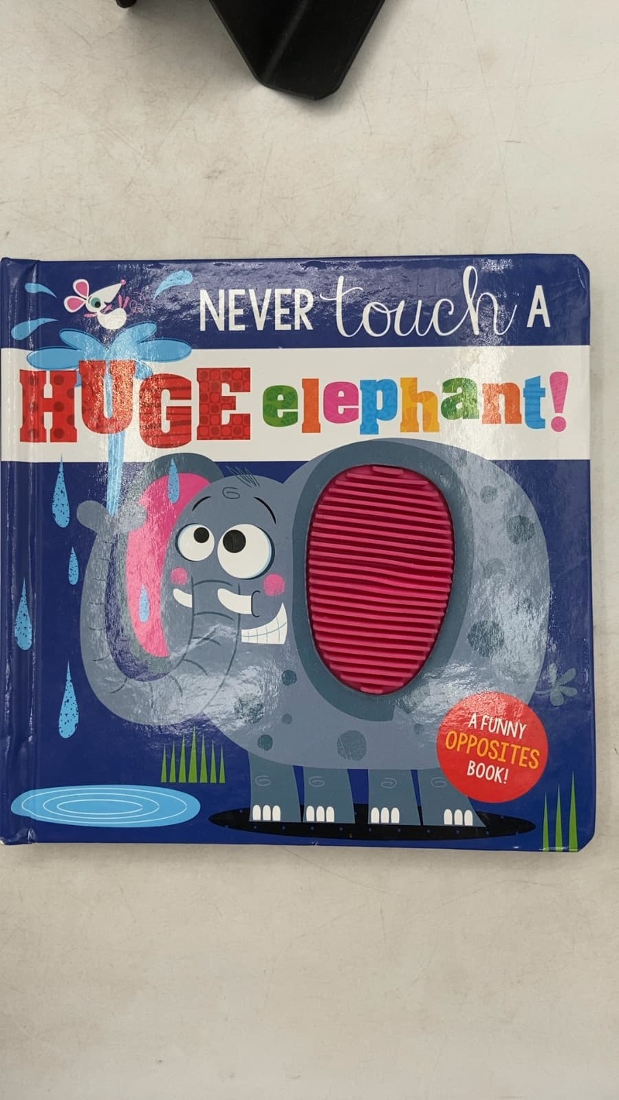Never Touch a Huge Elephant! by Rosie Greening - title page
