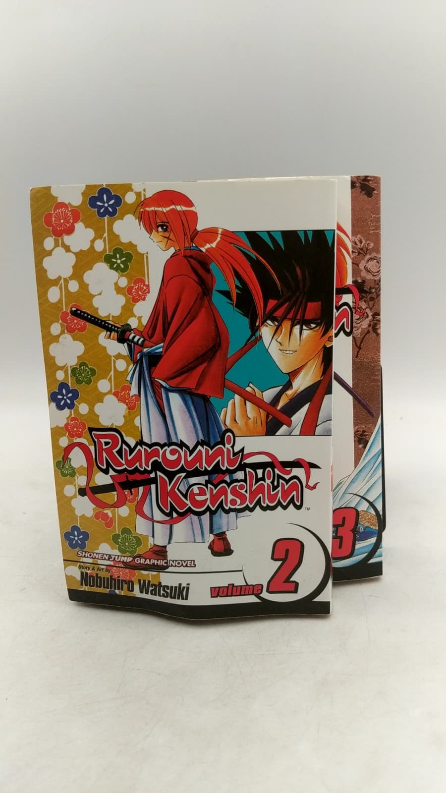 Rurouni Kenshin: Meiji Swordsman Romantic Story, Volumes 2 & 3 by Nobuhiro Watsuki - front cover