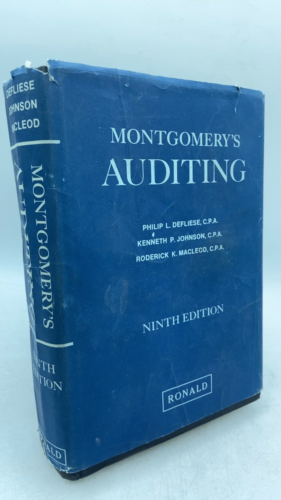 Montgomery's Auditing by Philip L. Defliese, Kenneth P. Johnson, Roderick K. Macleod - front cover