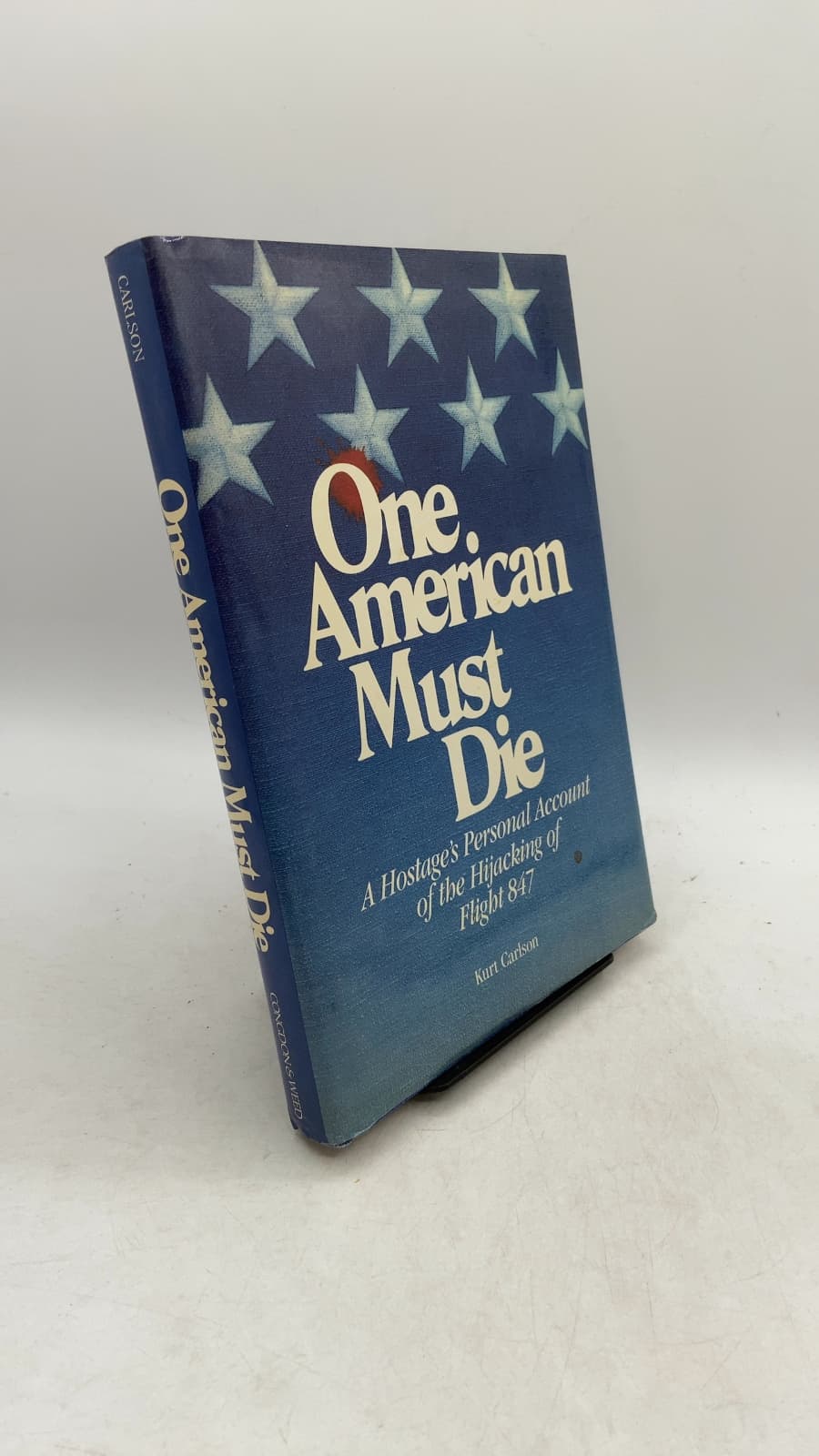 One American Must Die: A Hostage's Personal Account of the Hijacking of Flight 847 by Kurt Carlson - front cover