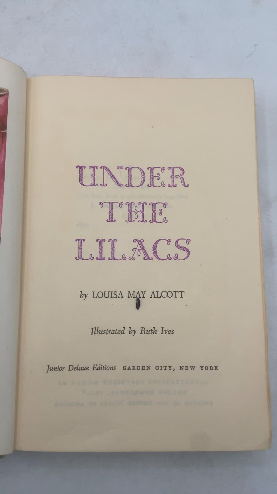 Under THE Lilacs by Louisa MAY Alcott - title page