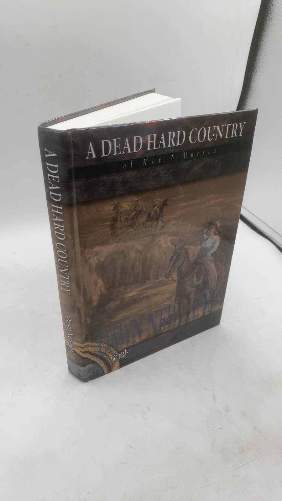 A Dead Hard Country: Of Men & Horses by Dawn Newland - front cover
