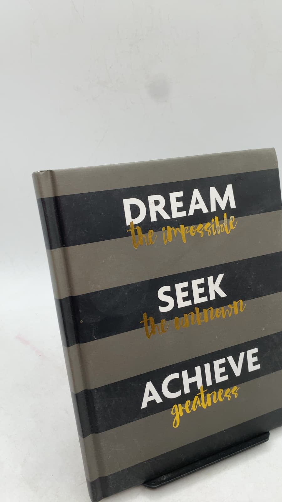 DREAM the impossible SEEK the unknown ACHIEVE greatness by angela mader - front cover