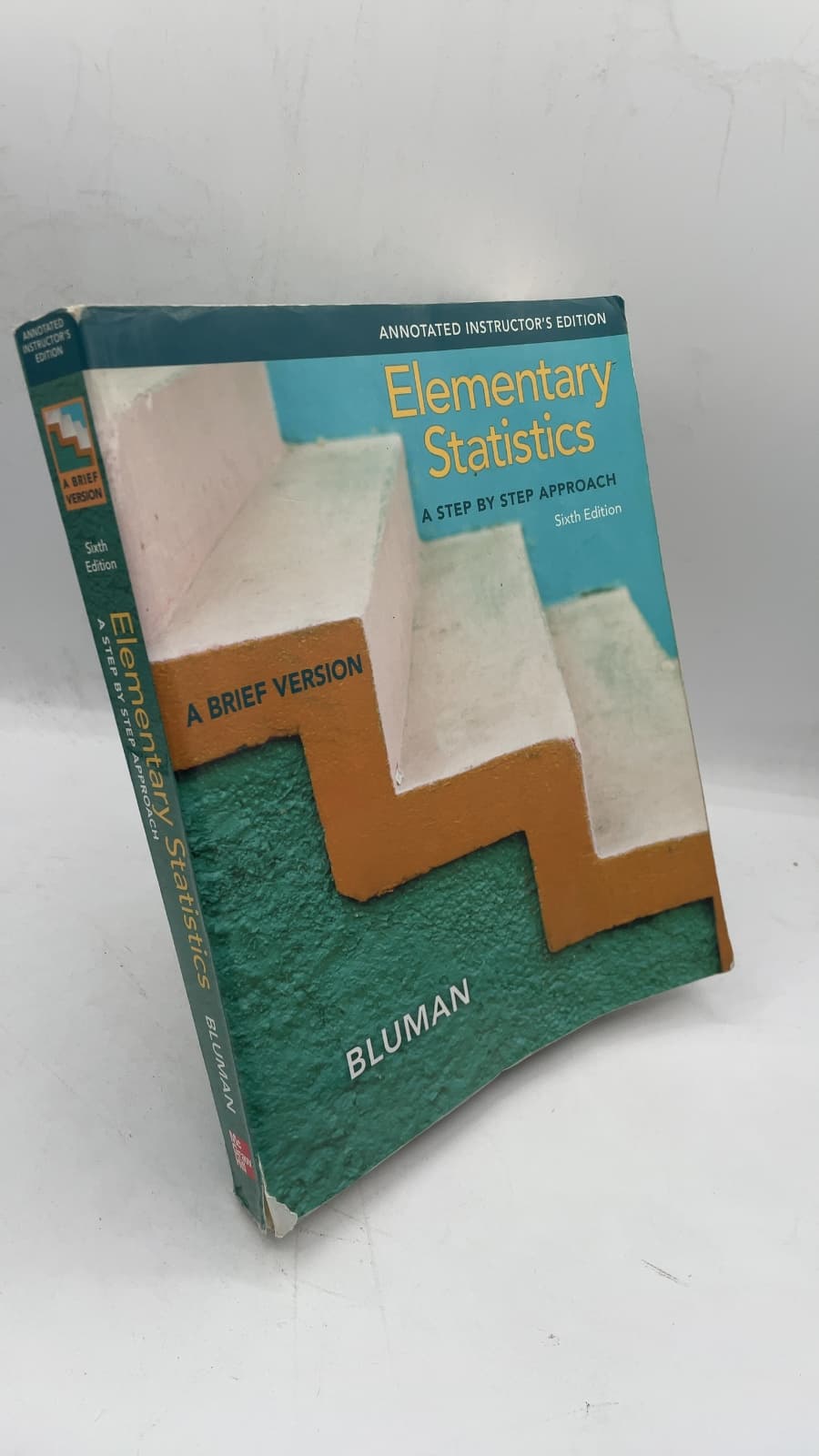 Elementary Statistics: A Step by Step Approach, A Brief Version by Allan G. Bluman - front cover