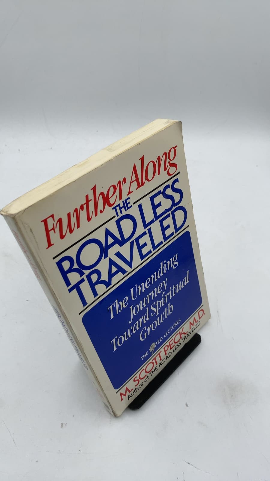 Further Along the Road Less Traveled: The Unending Journey Toward Spiritual Growth by M. Scott Peck, M.D. - front cover