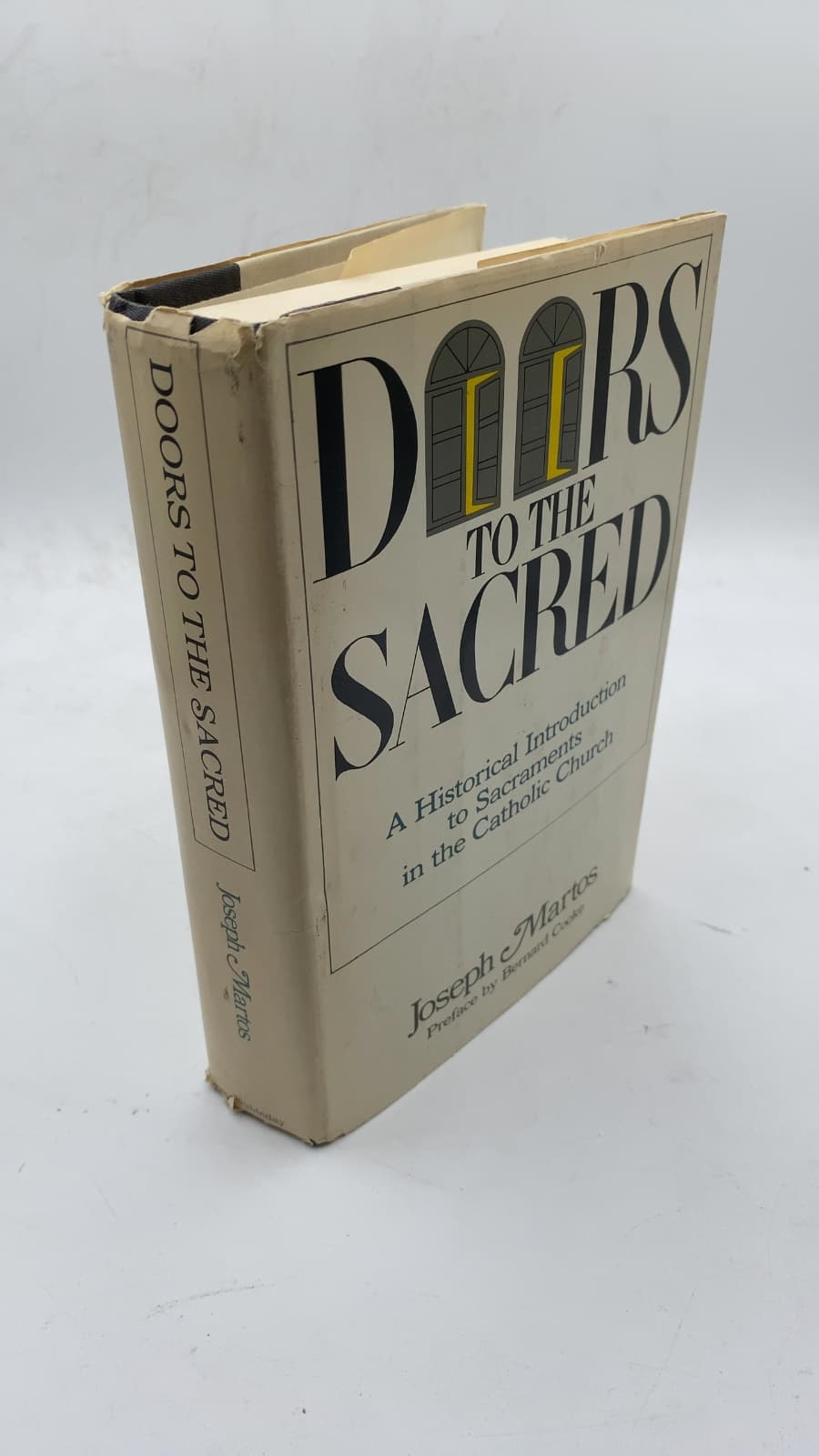Doors to the Sacred: A Historical Introduction to Sacraments in the Catholic Church by Joseph Martos - front cover