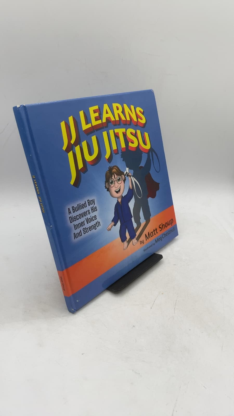 JJ Learns Jiu Jitsu: A Bullied Boy Discovers His Inner Voice and Strength by Matt Shoup - front cover