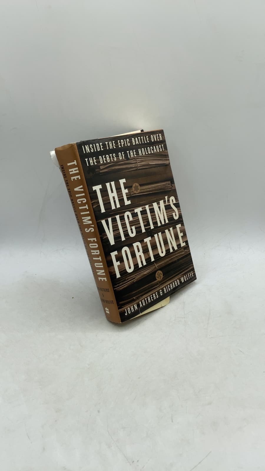 The Victim's Fortune: Inside the Epic Battle over the Debts of the Holocaust by John Authers and Richard Wolffe - front cover