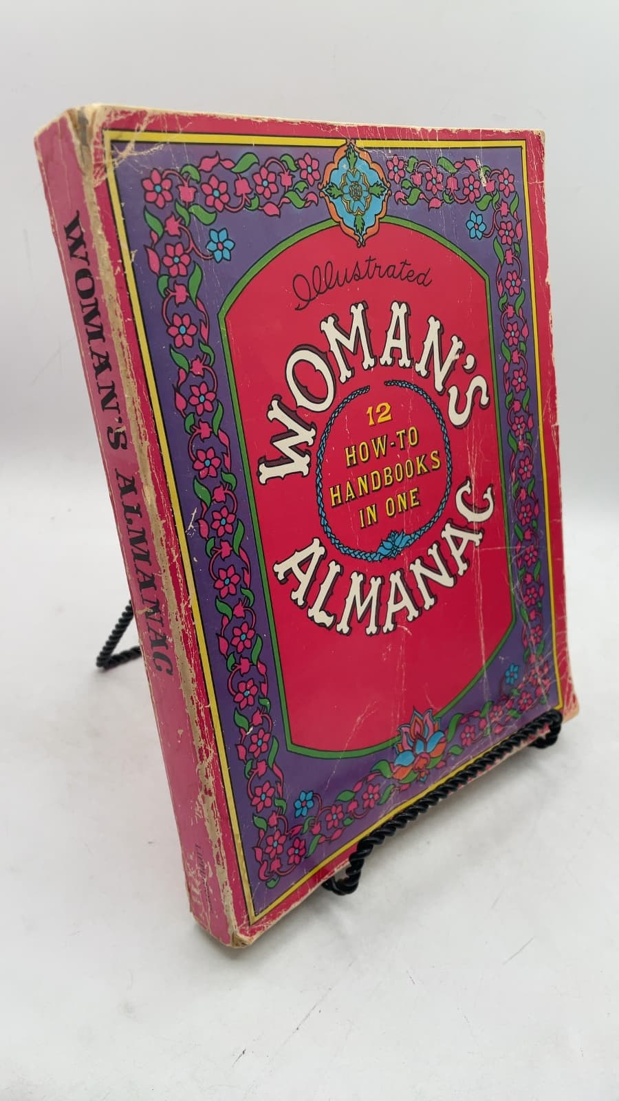 Woman's Almanac: 12 How-To Handbooks in One by Kathryn Paulsen and Ryan A. Kuhn - front cover