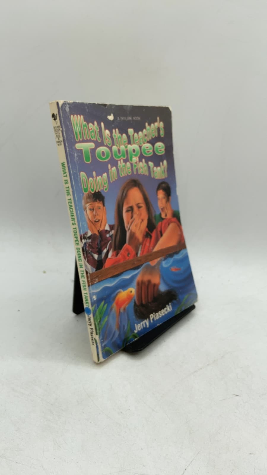 What Is the Teacher's Toupee Doing in the Fish Tank?