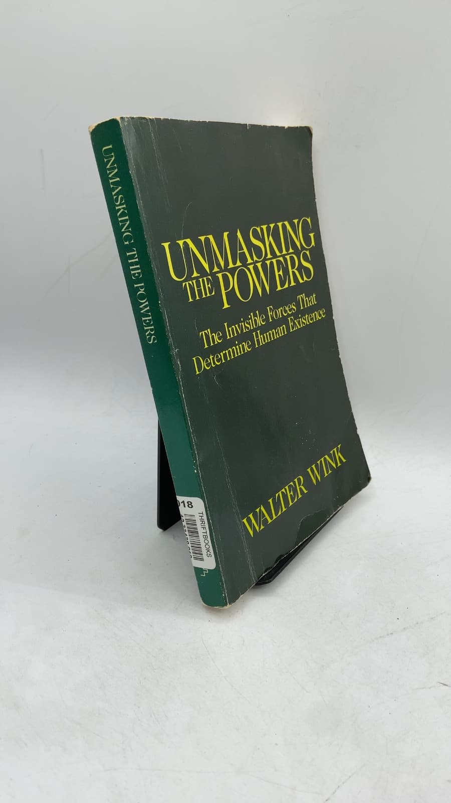 Unmasking the Powers: The Invisible Forces That Determine Human Existence by Walter Wink - front cover