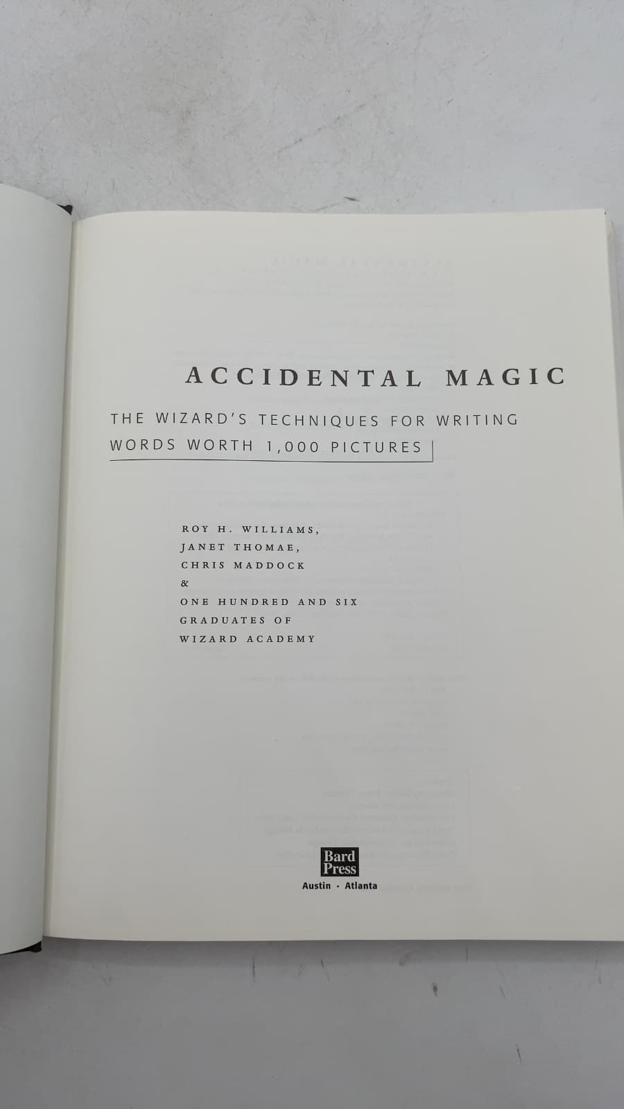 Accidental Magic: The Wizard's Techniques for Writing Words Worth 1,000 Pictures by Roy H. Williams, Janet Thomae, Chris Maddock, and One Hundred and Six Graduates of Wizard Academy - title page