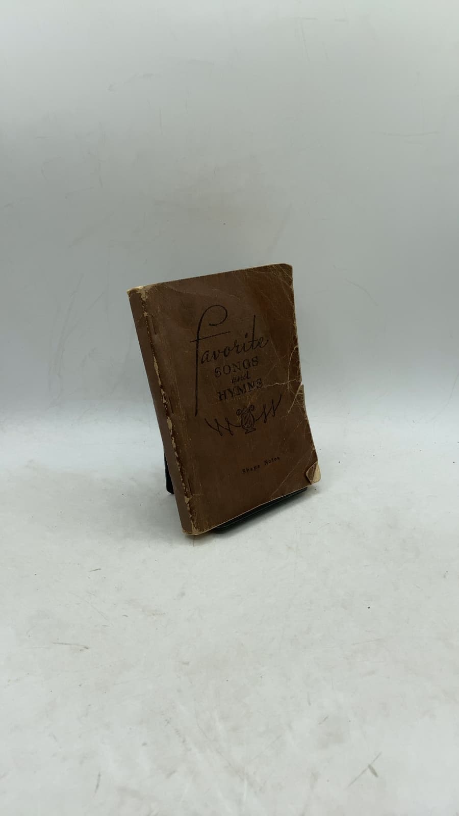 Favorite Songs and Hymns: A Complete Church Hymnal by Homer F. Morris, Virgil O. Stamps, J. R. Baxter, Jr., W. W. Combs - front cover