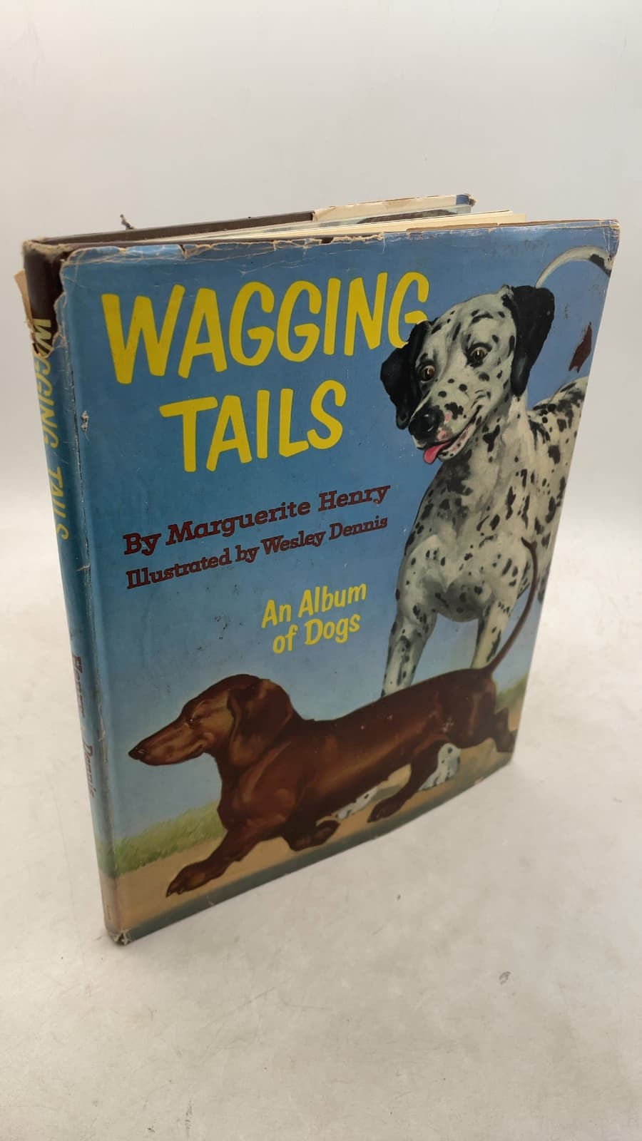 Wagging Tails: An Album of Dogs by Marguerite Henry - front cover