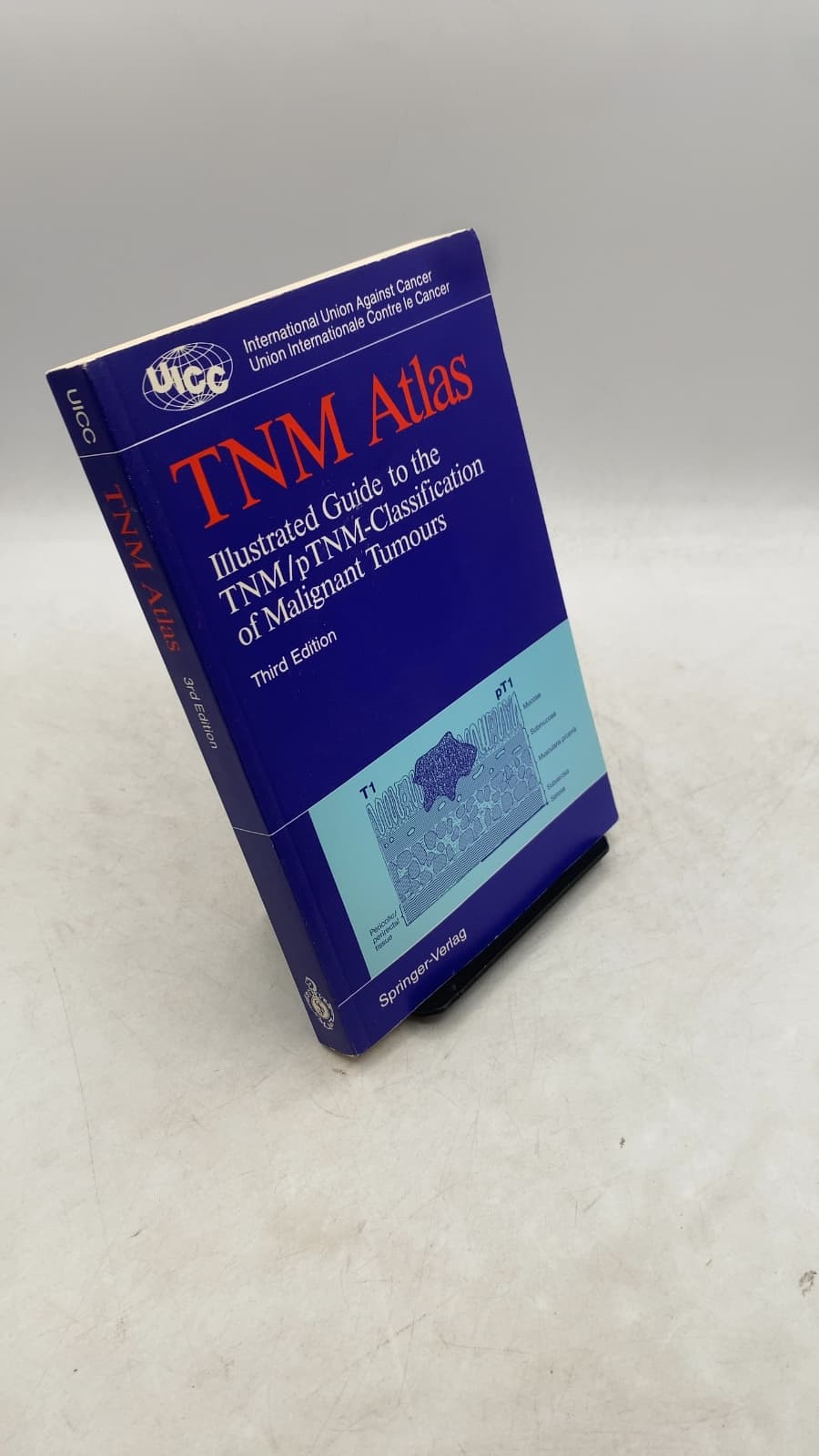 TNM Atlas: Illustrated Guide to the TNM/pTNM-Classification of Malignant Tumours by Edited by B. Spiessl, O. H. Beahrs, P. Hermanek, R. V. P. Hutter, O. Scheibe, L. H. Sobin, G. Wagner - front cover