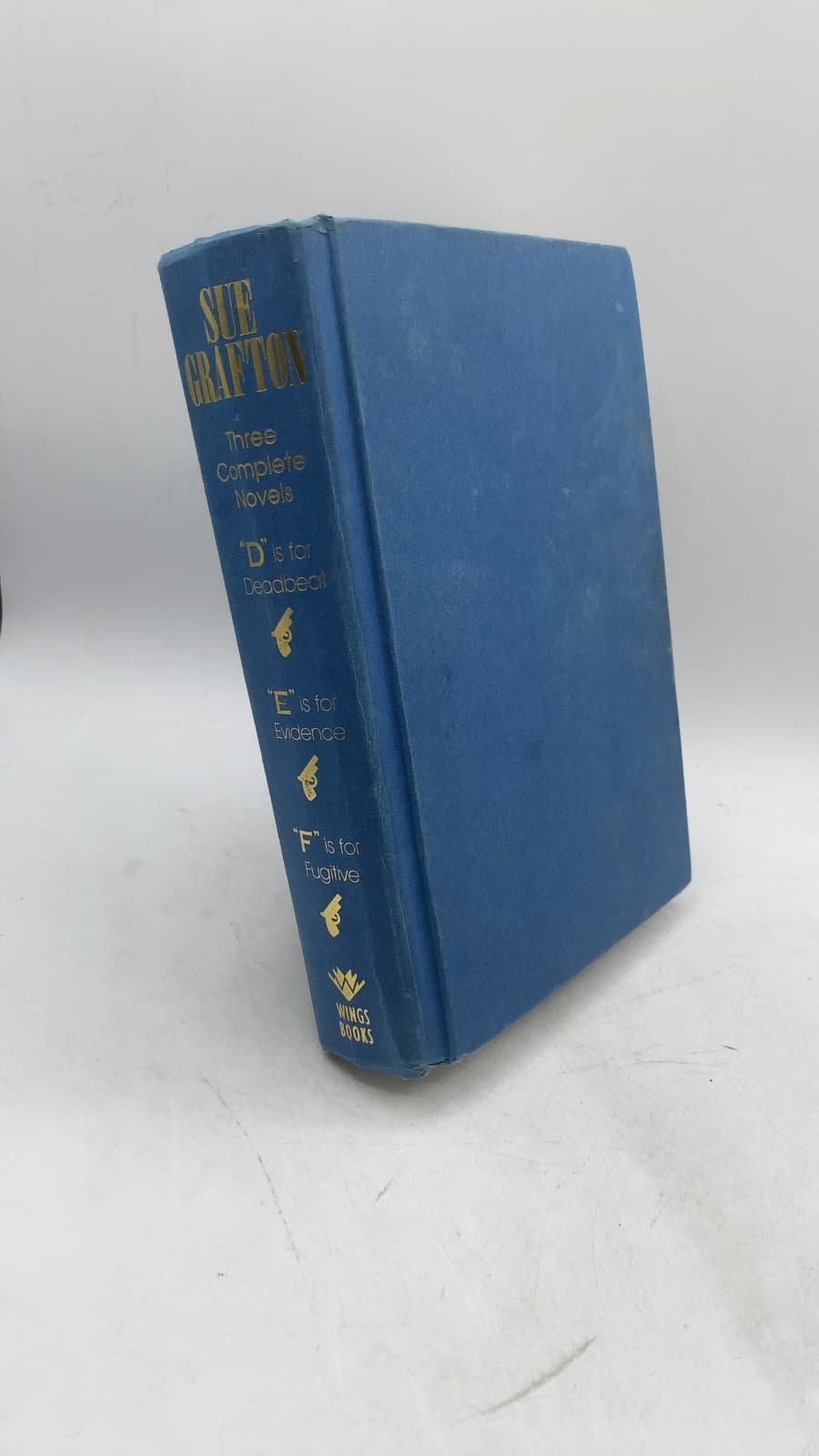 Three Complete Novels: "D" is for Deadbeat, "E" is for Evidence, "F" is for Fugitive by Sue Grafton - front cover