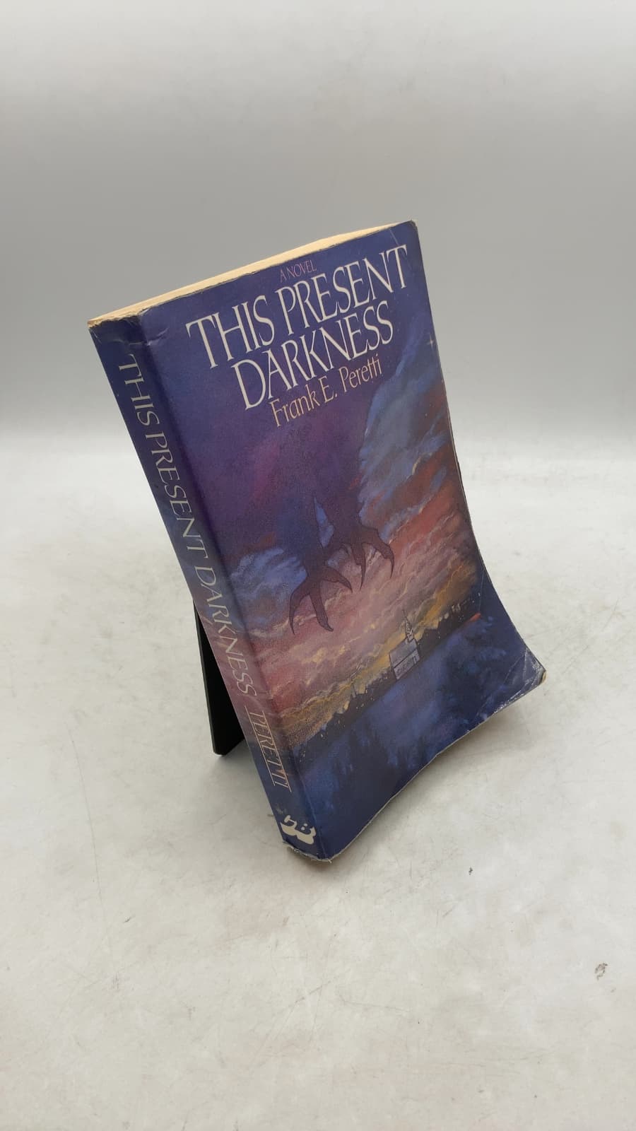 This Present Darkness by Frank E. Peretti - front cover