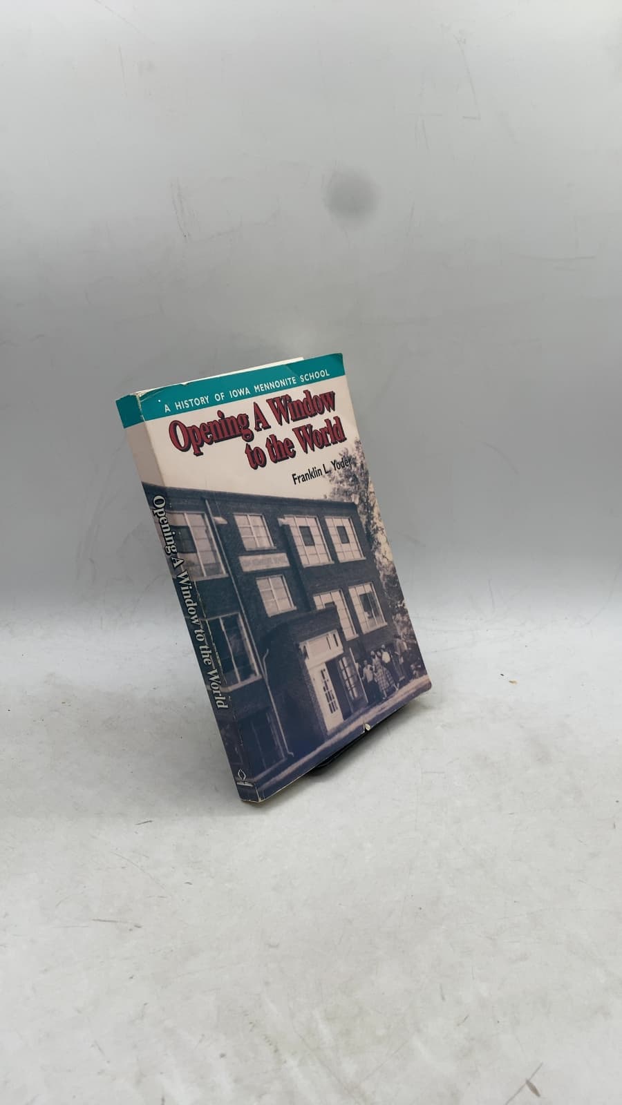 Opening A Window to the World: A History of Iowa Mennonite School by Franklin L. Yoder - front cover