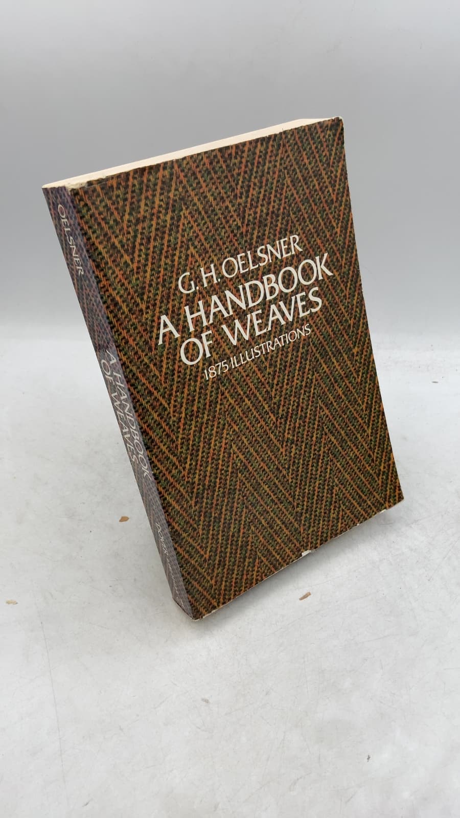 A Handbook of Weaves by G. H. Oelsner - front cover
