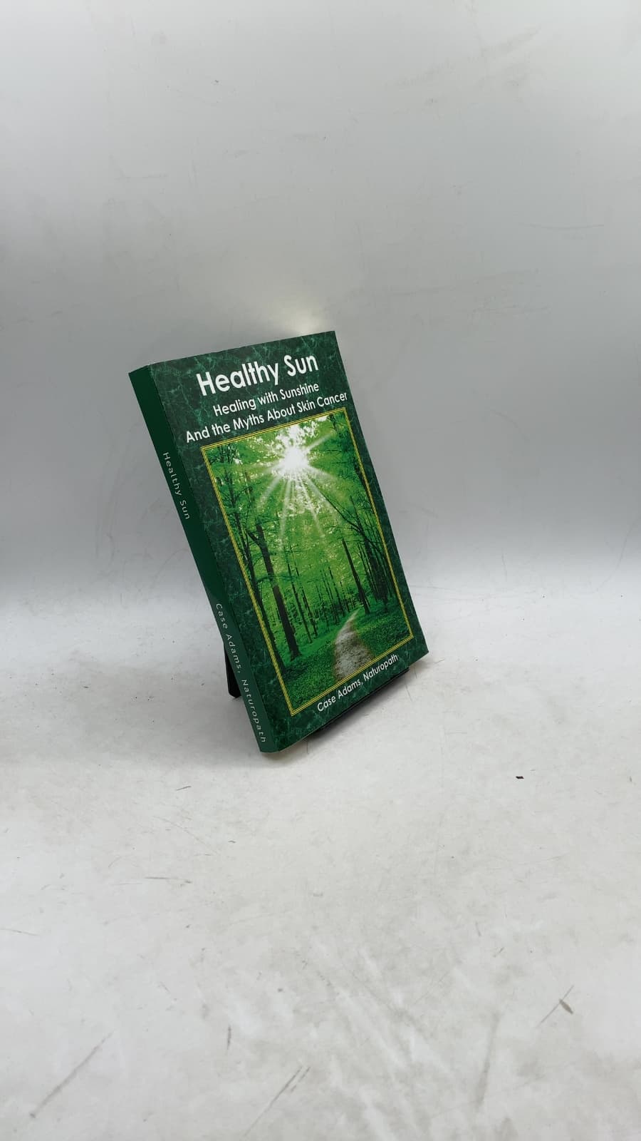 Healthy Sun: Healing with Sunshine and the Myths About Skin Cancer by Case Adams, Naturopath - front cover