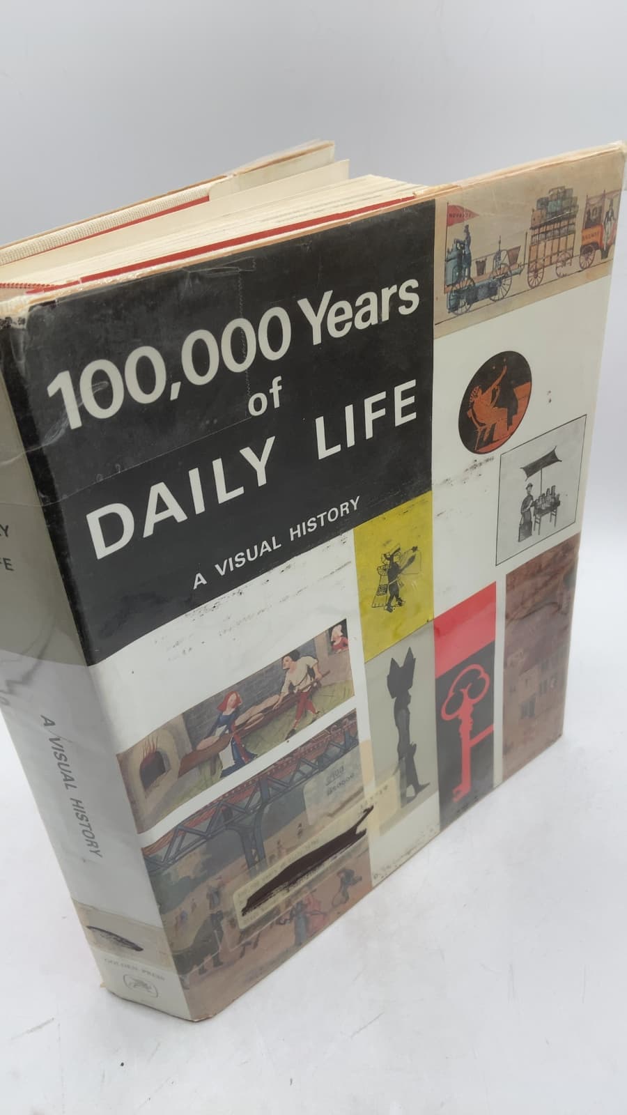 100,000 Years of Daily Life: A Visual History by Jacques Brosse, Paul Chaland, Jacques Ostier - front cover
