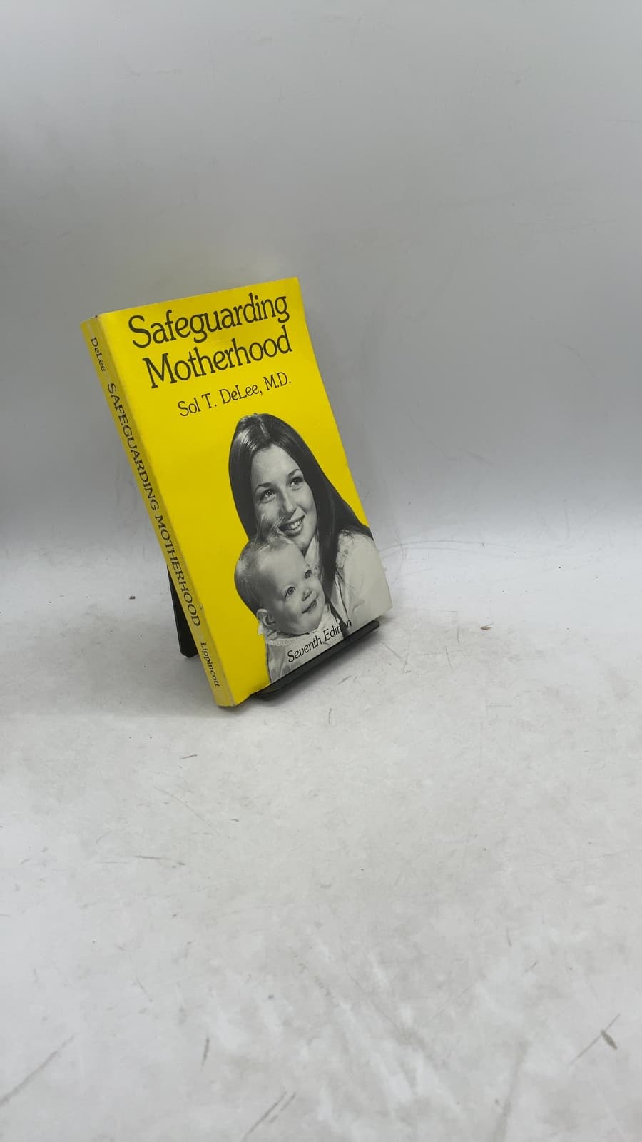 Safeguarding Motherhood by Sol T. DeLee, M.D. - front cover