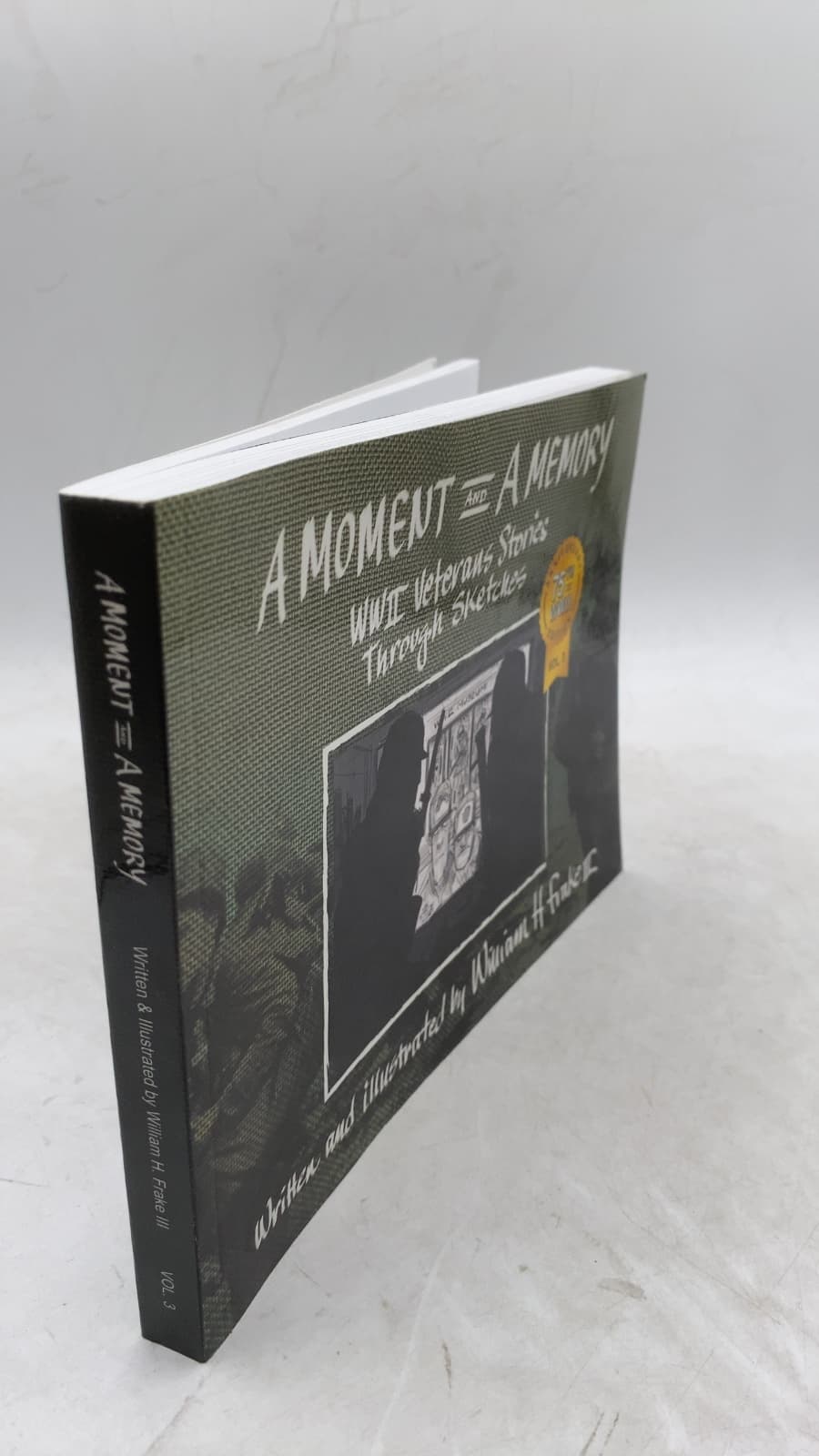 A Moment and a Memory: WWII Veterans Stories Through Sketches by William H. Frake III - front cover