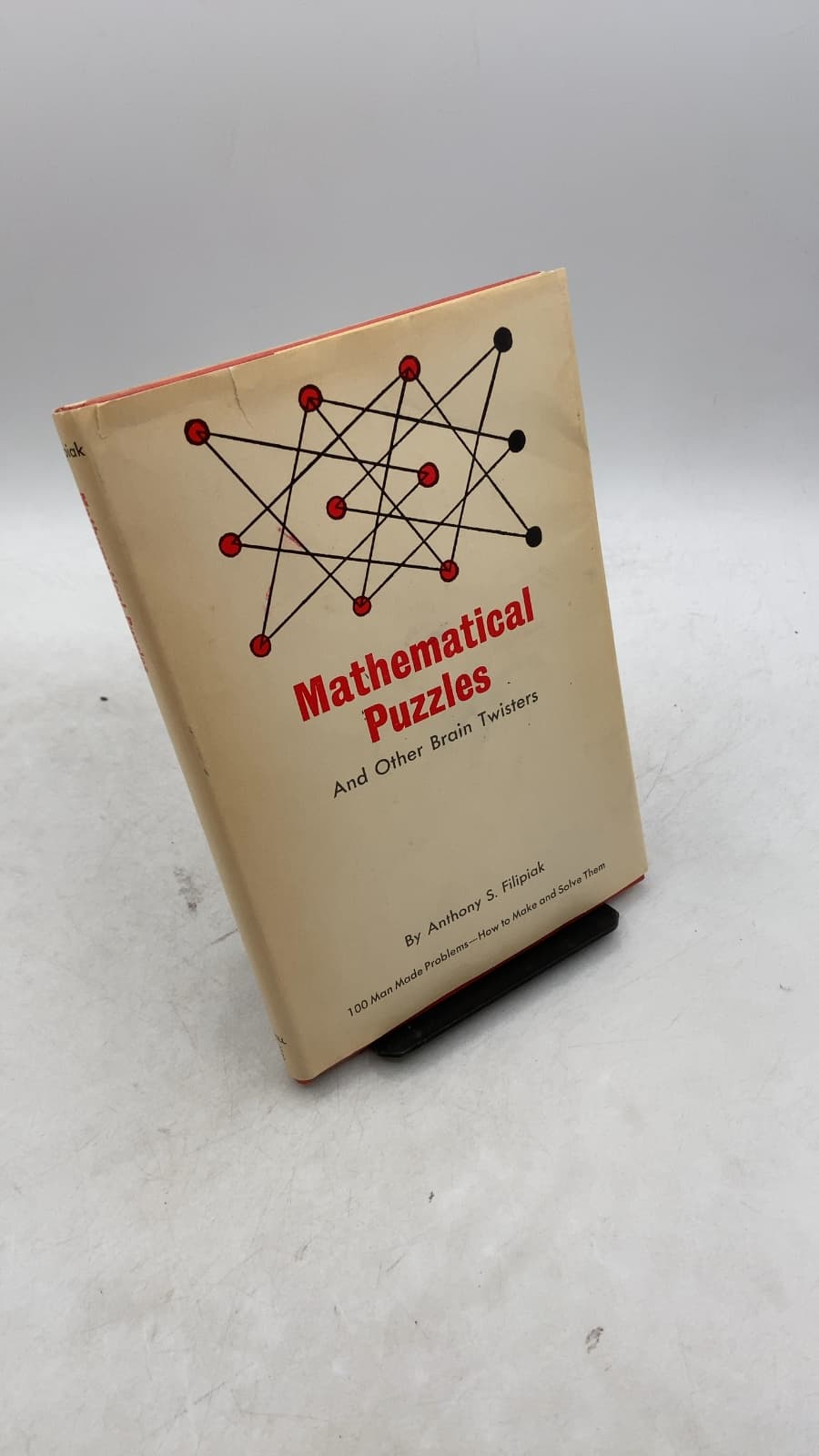 Mathematical Puzzles And Other Brain Twisters by Anthony S. Filipiak - front cover