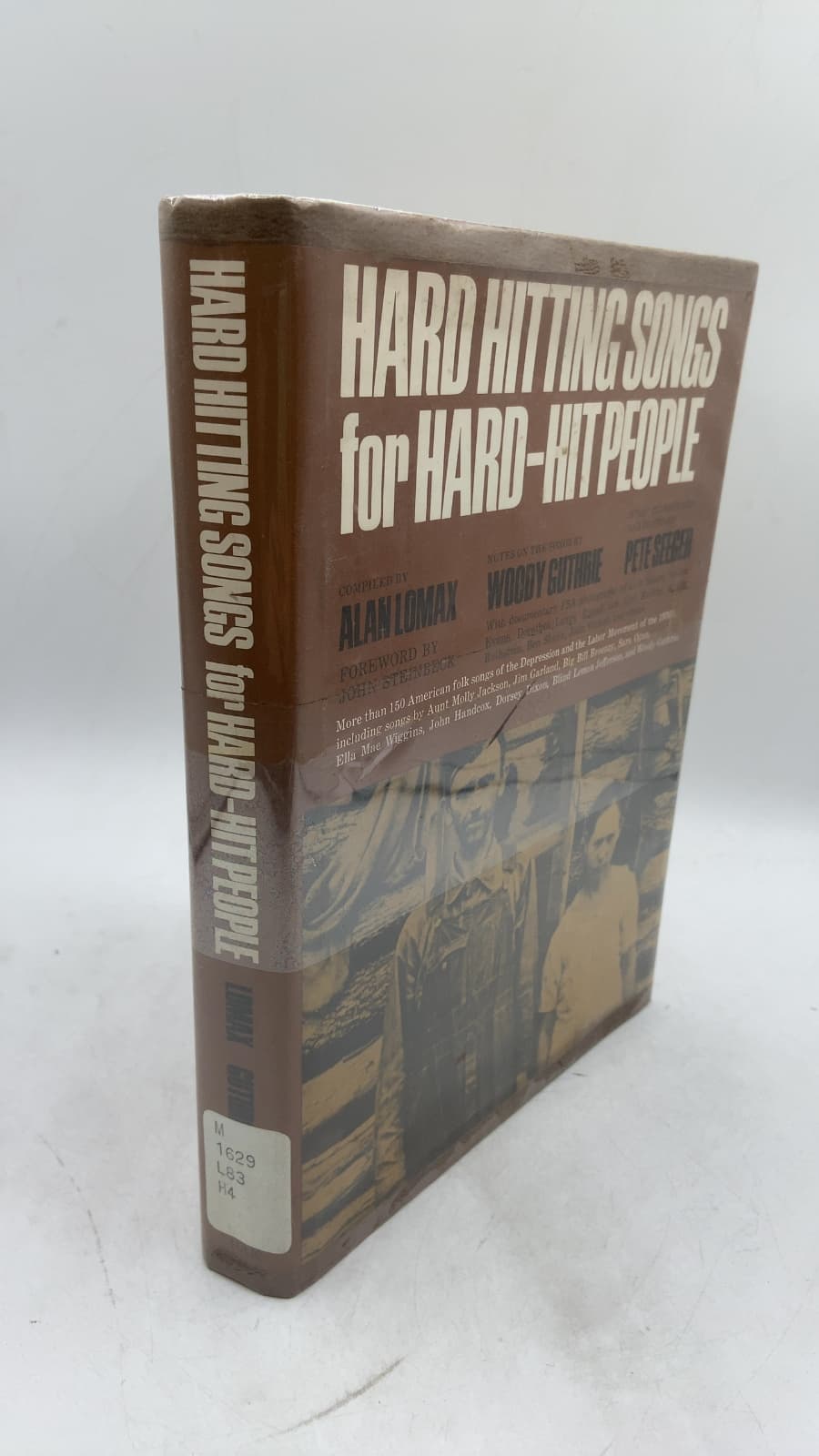 Hard Hitting Songs for Hard-HIT People by Alan Lomax, Woody Guthrie, Pete Seeger - front cover