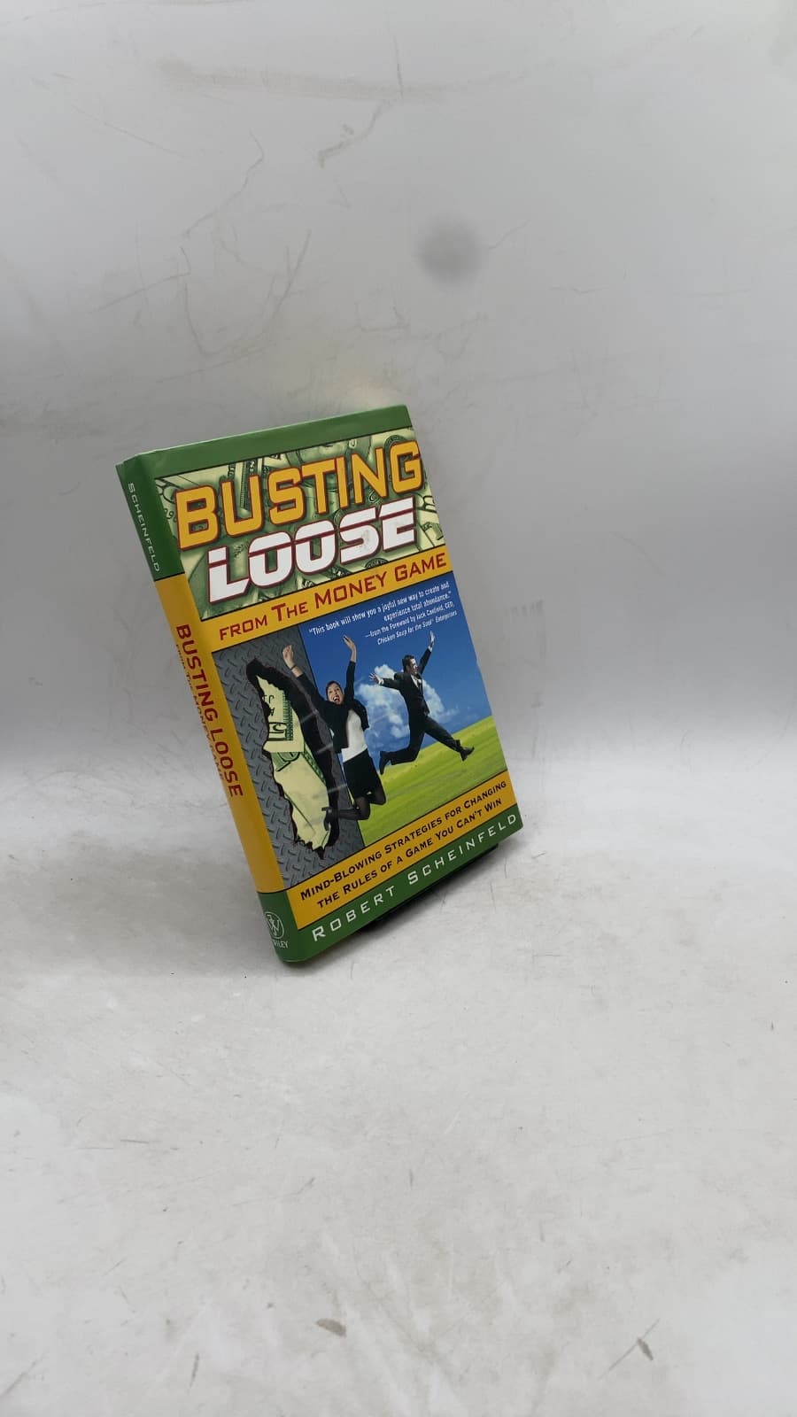 Busting Loose from the Money Game by Robert Scheinfeld - front cover