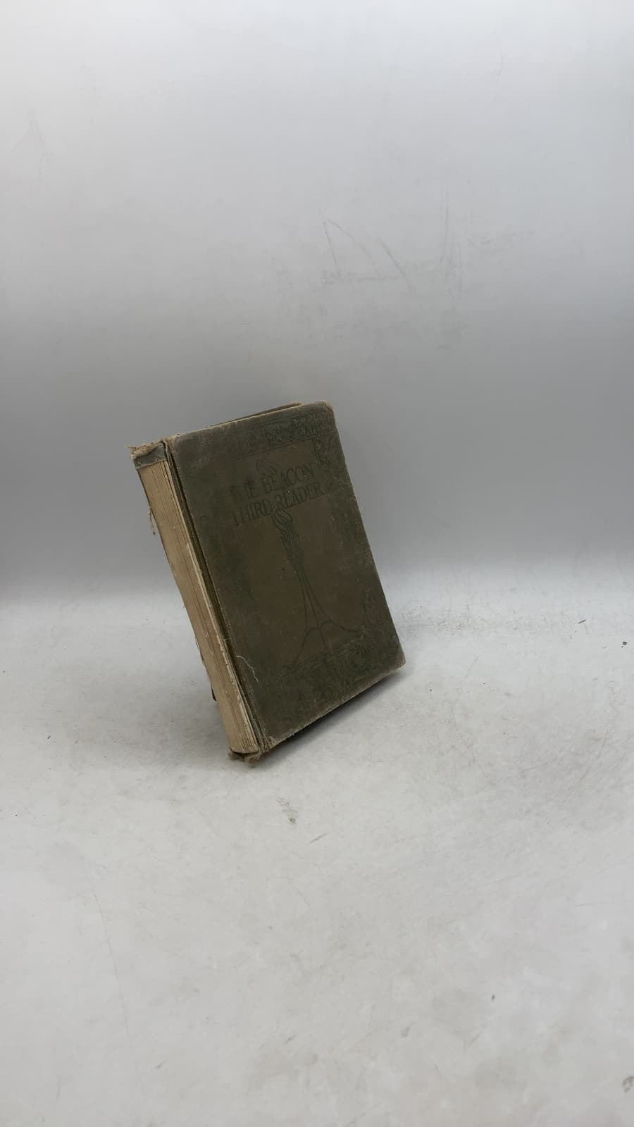 The Beacon Third Reader by James H. Fassett - front cover