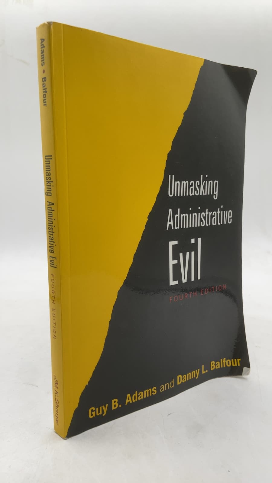 Unmasking Administrative Evil by Guy B. Adams and Danny L. Balfour - front cover
