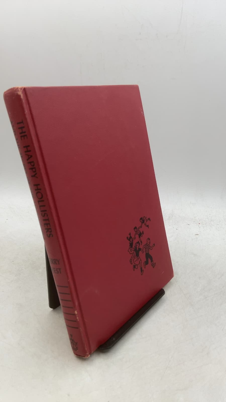 The Happy Hollisters and the Secret of the Lucky Coins by Jerry West - front cover