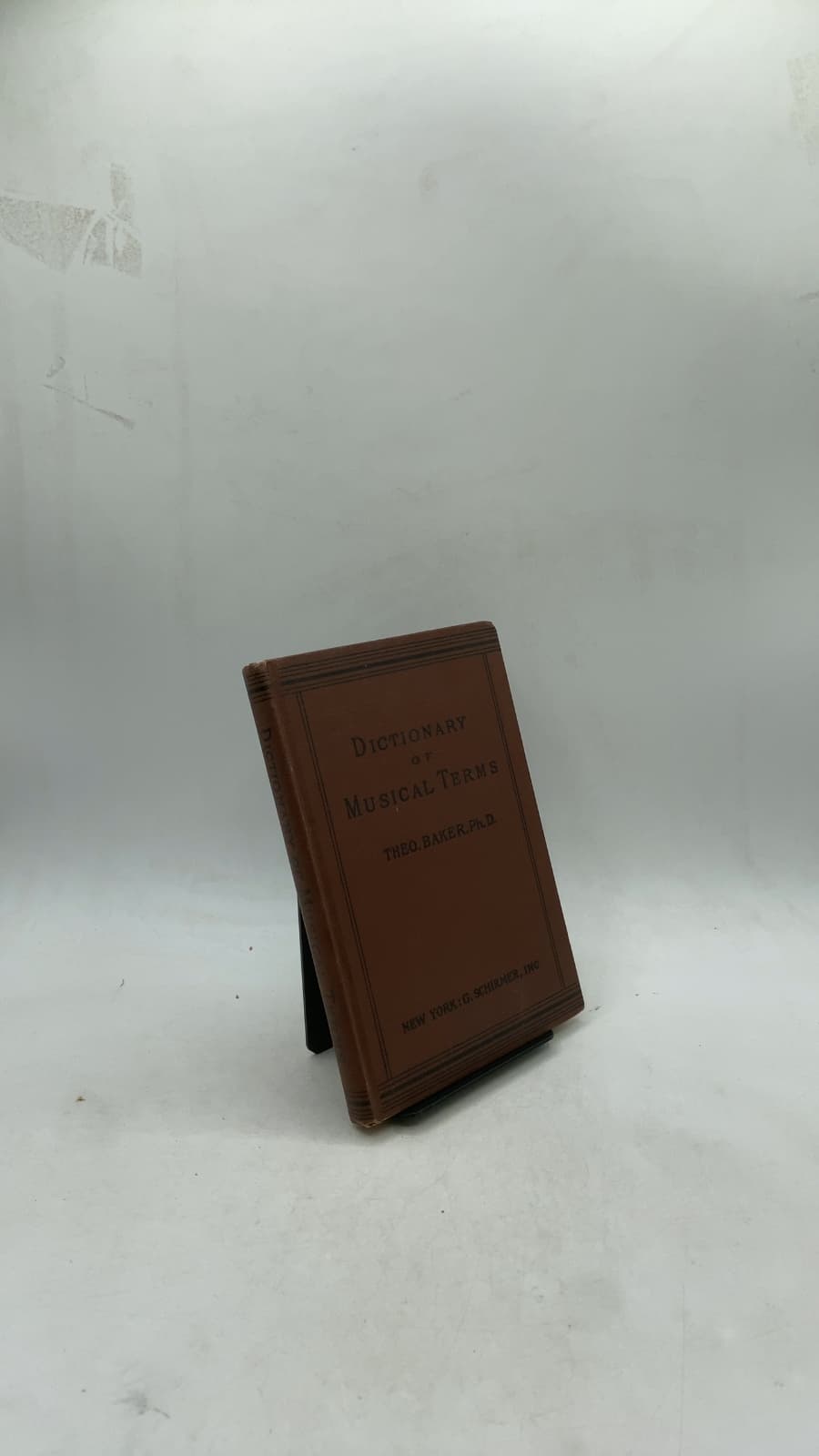Dictionary of Musical Terms by Theo. Baker, Ph.D. - front cover
