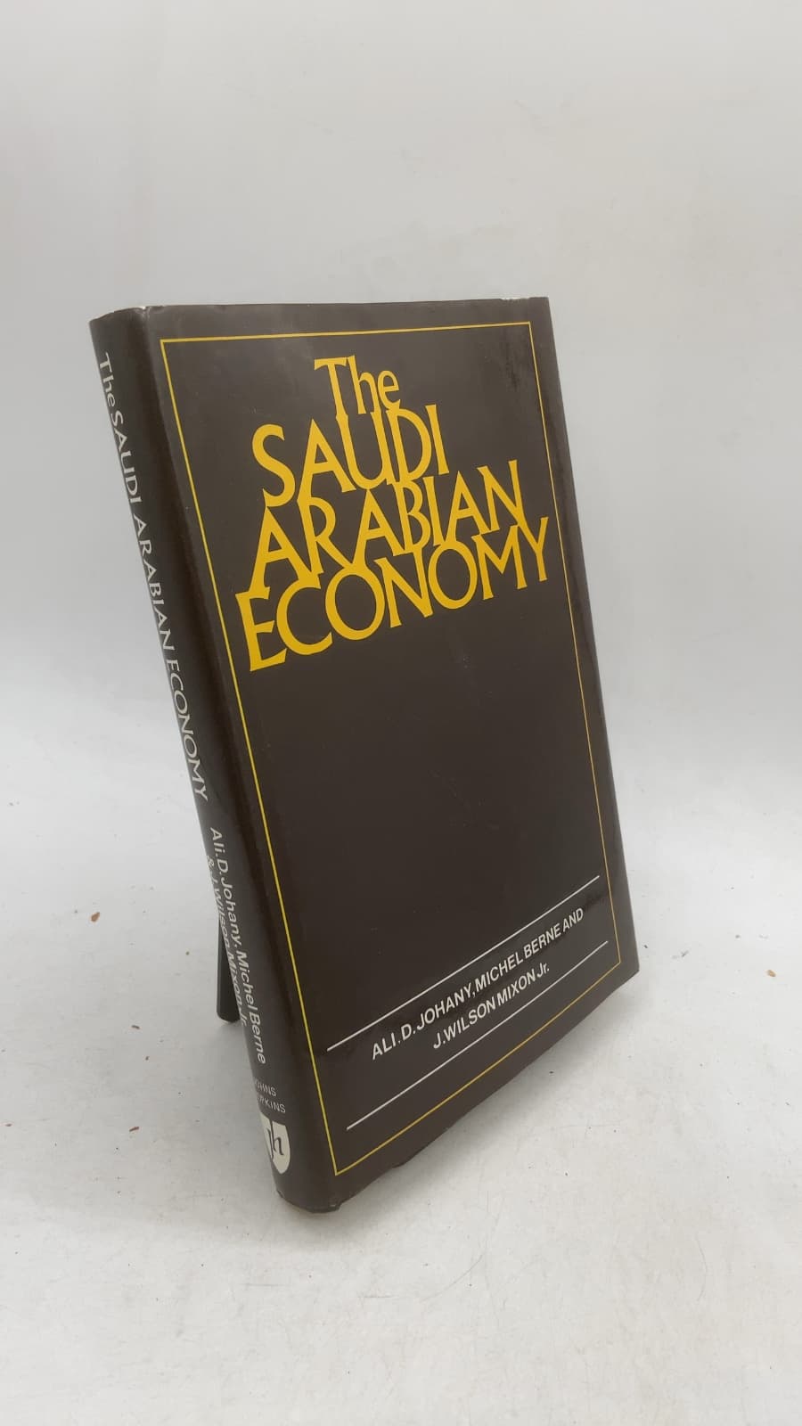 The Saudi Arabian Economy by Ali D. Johany, Michel Berne, and J. Wilson Mixon Jr. - front cover