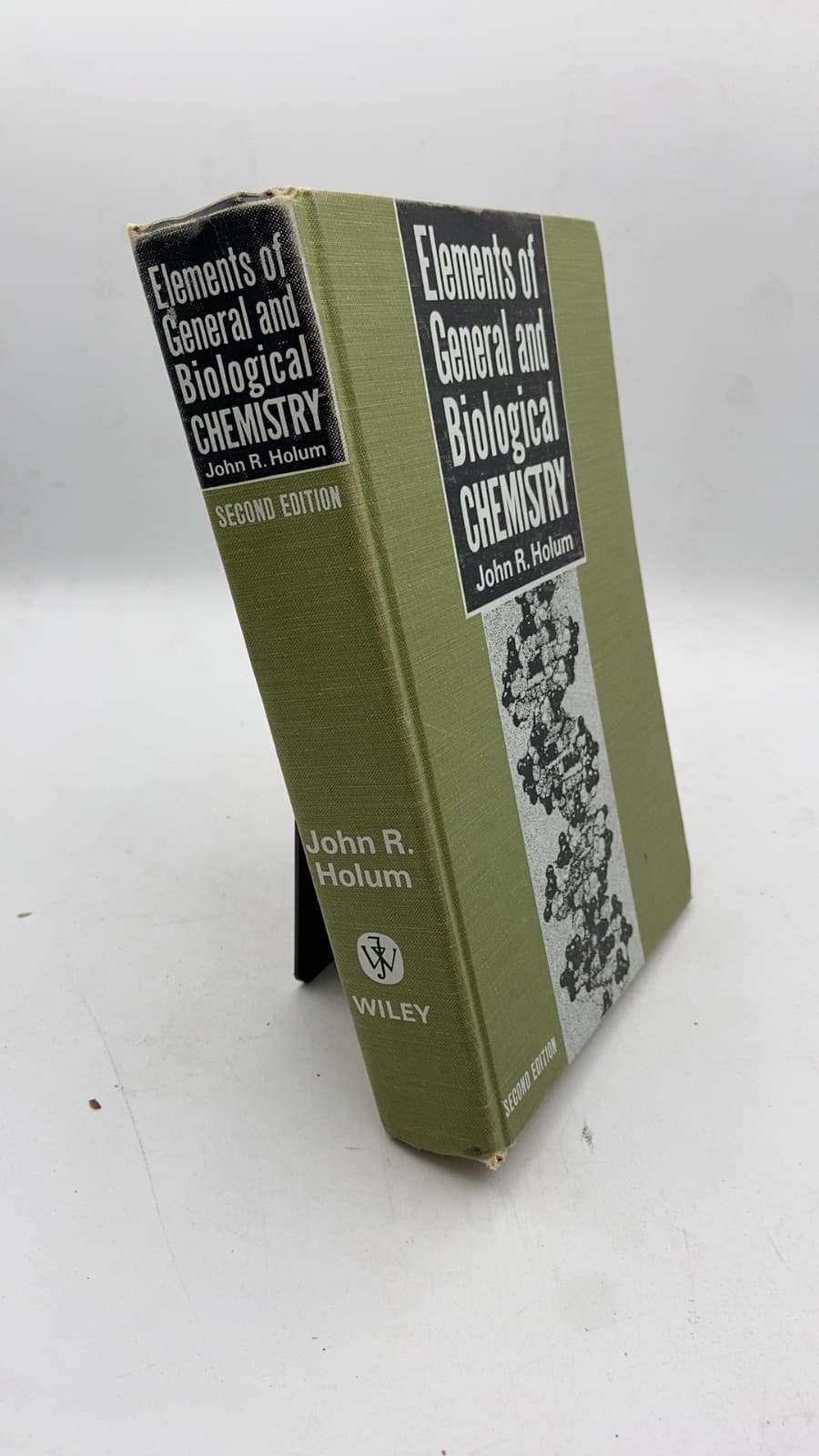 Elements of General and Biological Chemistry by John R. Holum, Ph.D. - front cover