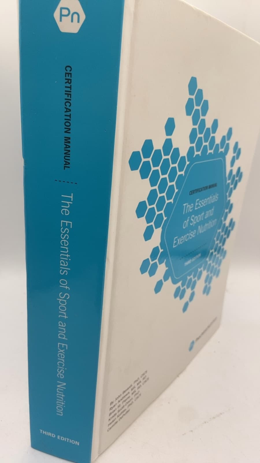 The Essentials of Sport and Exercise Nutrition by John Berardi, Ryan Andrews, Brian St. Pierre, Krista Scott-Dixon, Helen Kollias, Camille DePutter - front cover