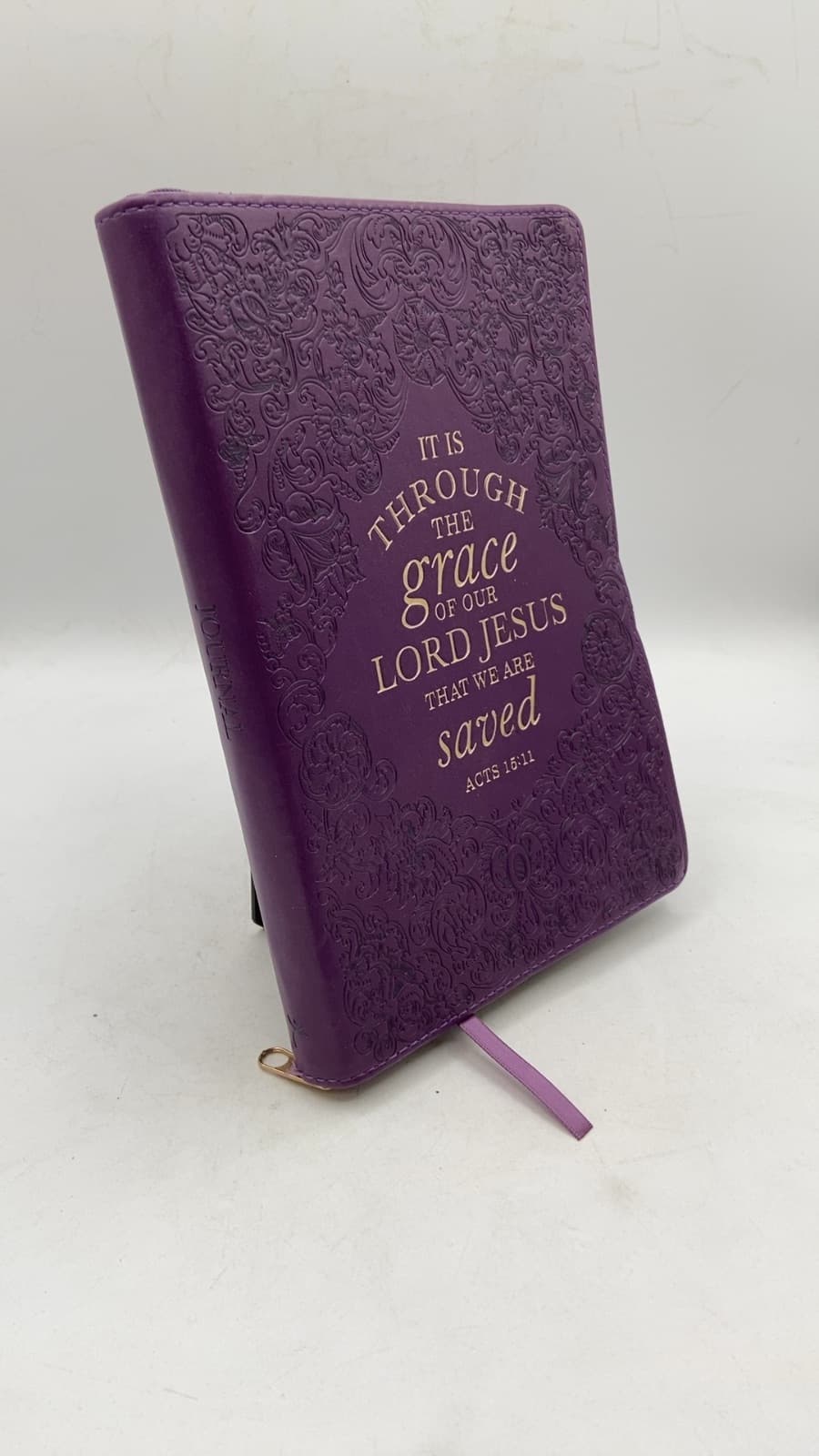 It is Through the Grace of Our Lord Jesus That We Are Saved - front cover