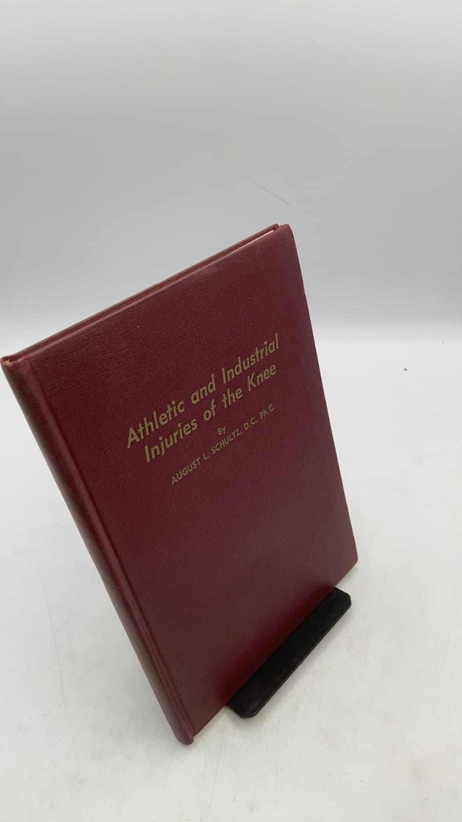 Athletic and Industrial Injuries of the Knee by August L. Schultz, D.C., Ph.C. - front cover