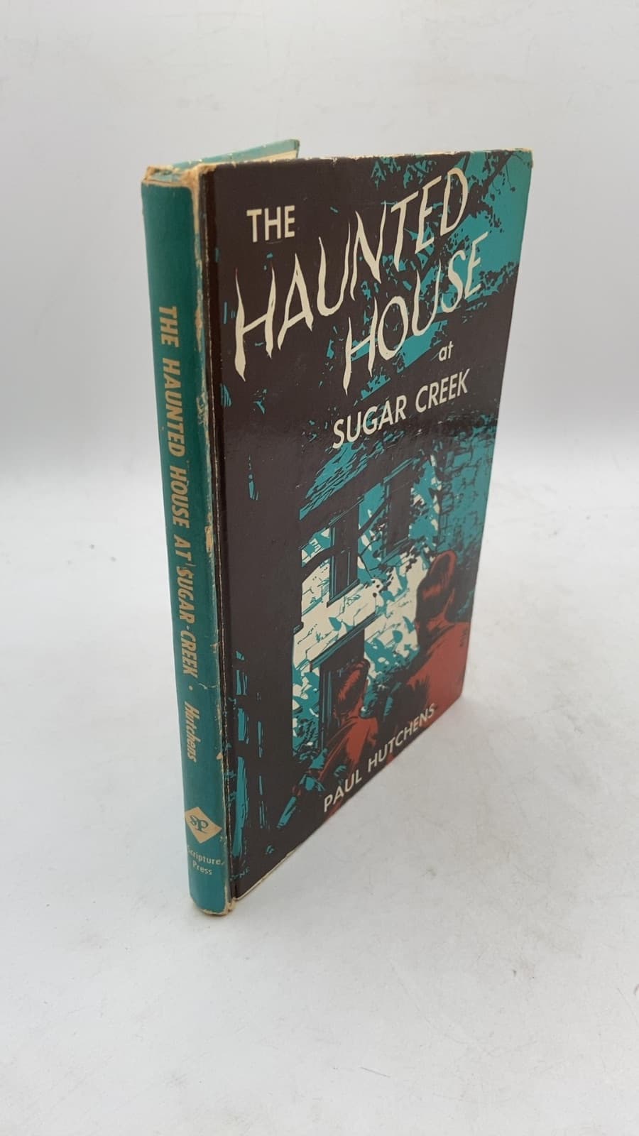 The Haunted House at Sugar Creek by Paul Hutchens - front cover