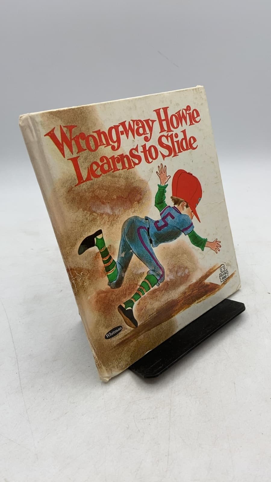 Wrong-way Howie Learns to Slide by Sylvia Peake - front cover