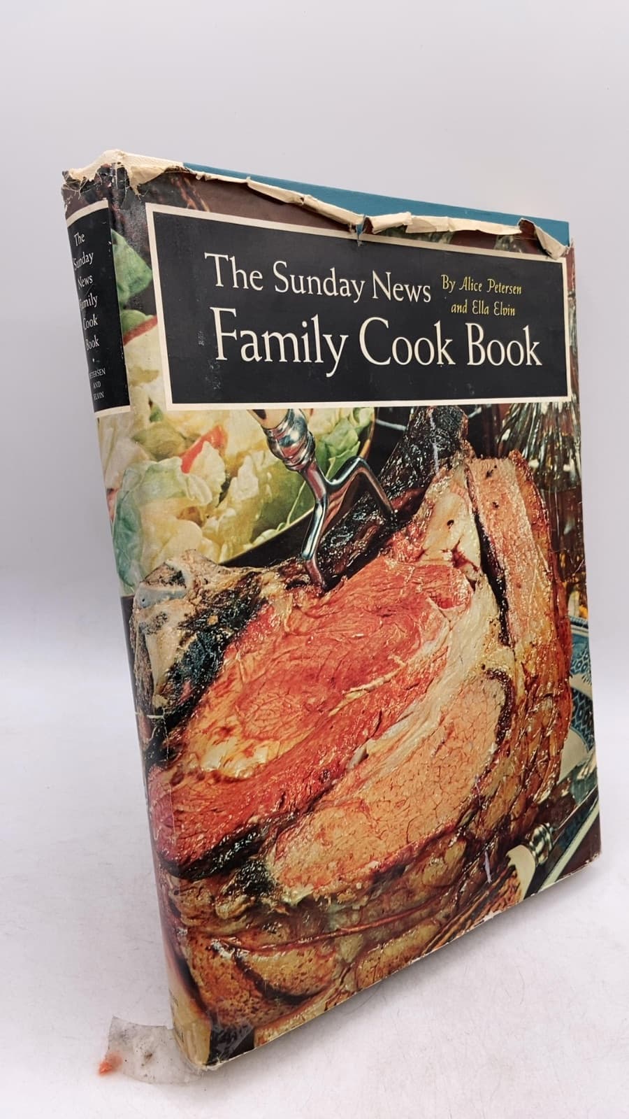 The Sunday News Family Cook Book by Alice Petersen and Ella Elvin - front cover