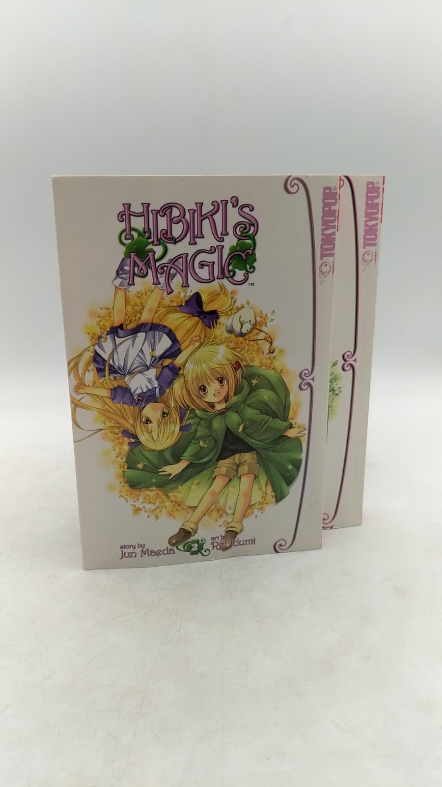 Hibiki's Magic Volumes 1 & 2 by Rei Idumi & Jun Maeda - front cover