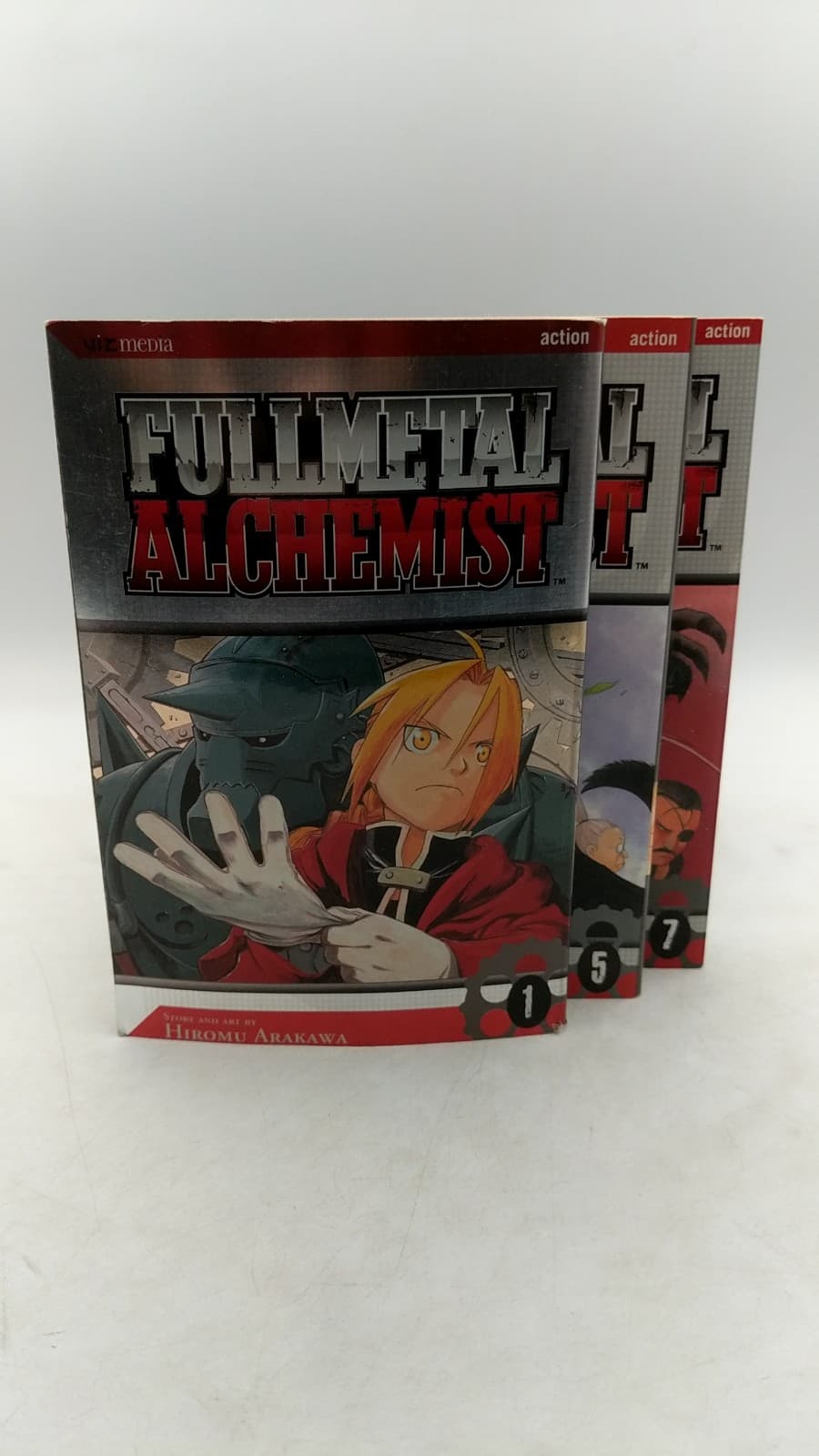 Fullmetal Alchemist Volumes 1, 5, 7 by Hiromu Arakawa - front cover