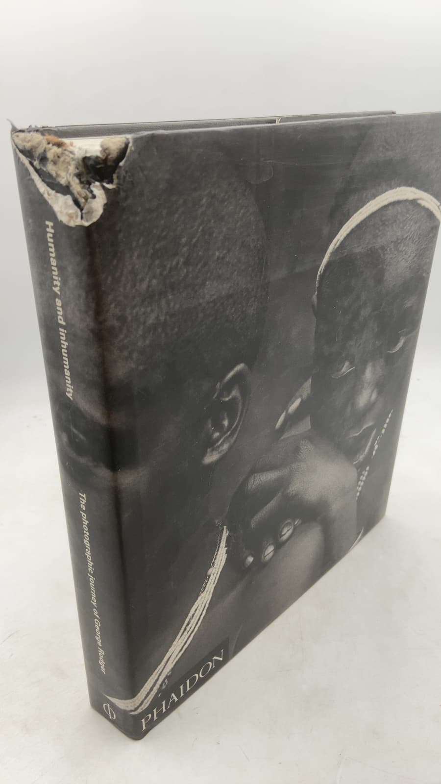 Humanity and Inhumanity: The Photographic Journey of George Rodger by Bruce Bernard - front cover