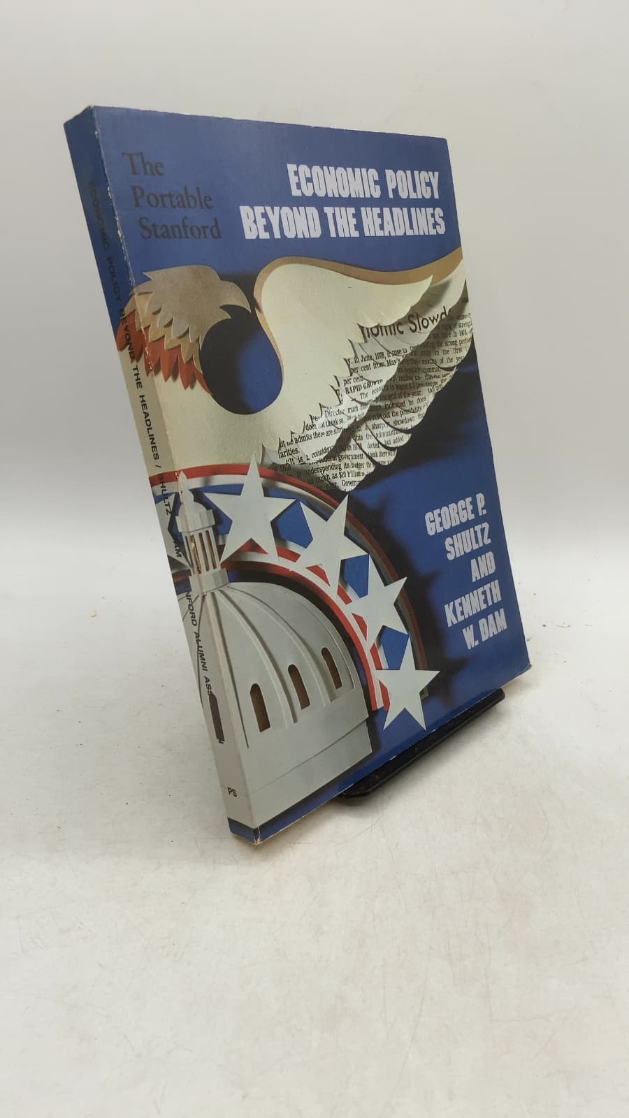 Economic Policy Beyond the Headlines by George P. Shultz and Kenneth W. Dam - front cover