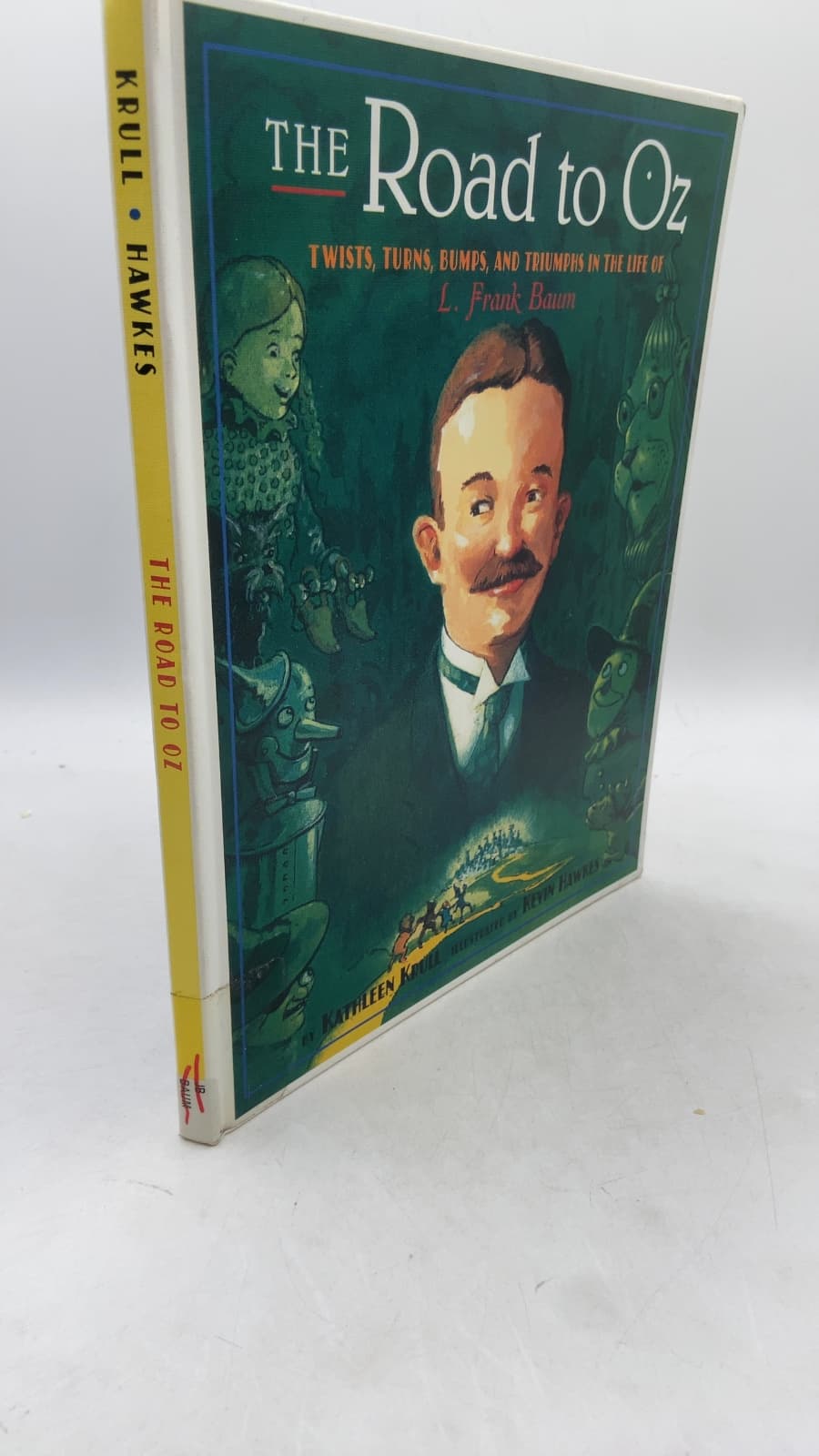 The Road to Oz: Twists, Turns, Bumps, and Triumphs in the Life of L. Frank Baum by Kathleen Krull - front cover